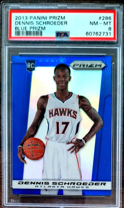 2013-14 Panini Prizm Blue Prizm Dennis Schröder RC Rookie PSA 8 Atlanta Hawks.
