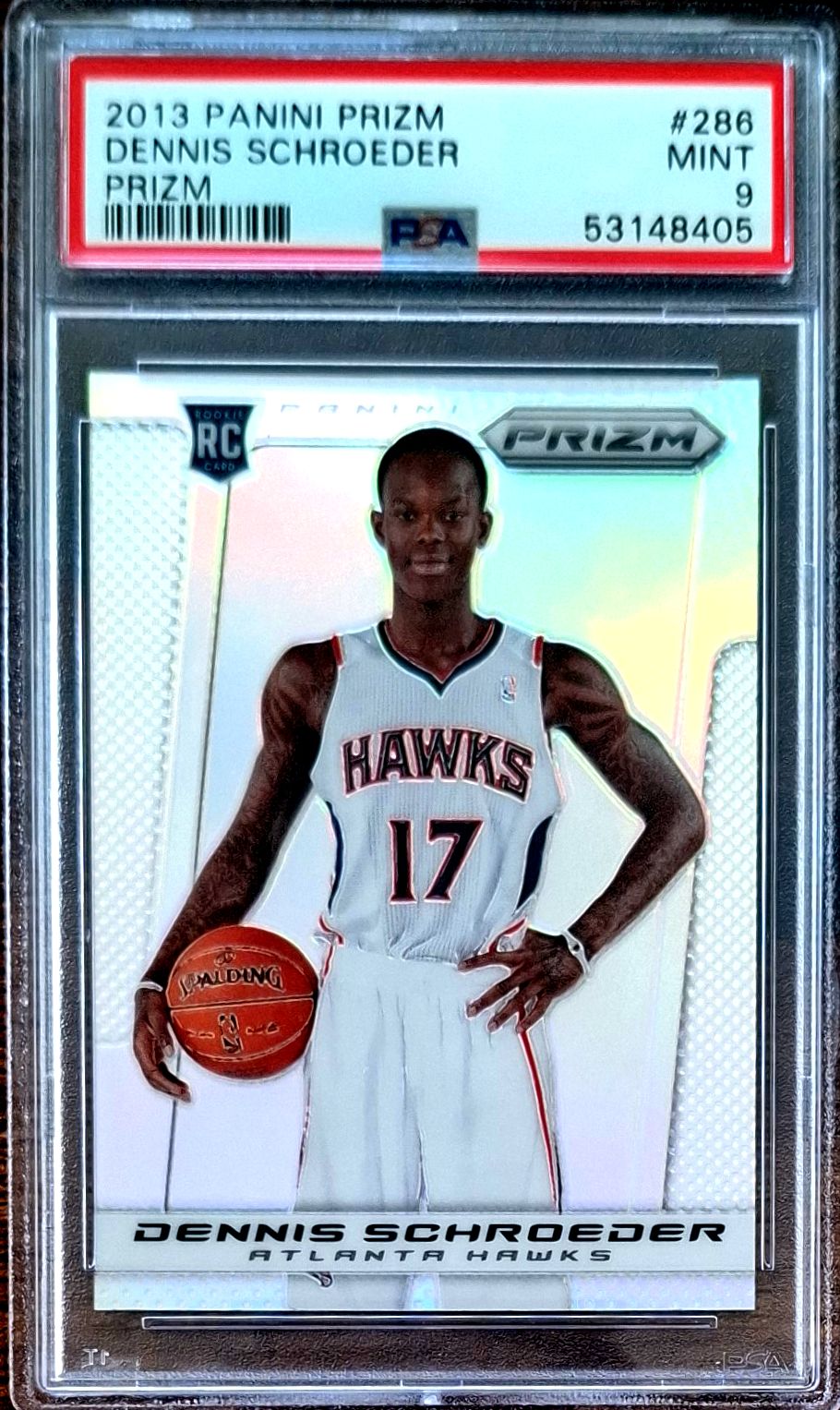 2013-14 Panini Prizm Silver Prizm Dennis Schröder RC Rookie PSA 9 Mint Atlanta Hawks.